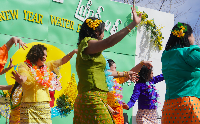 women dancing as part of the Burmese Thingyan Water Festival