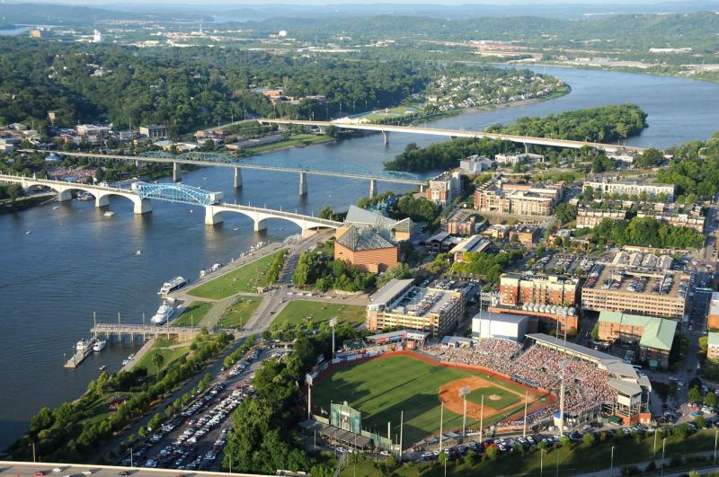 Aerial photo of a Lookouts game at AT&T field with view of river and downtown