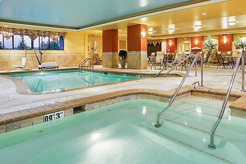 Indoor pool and hot tub at Holiday Inn Express