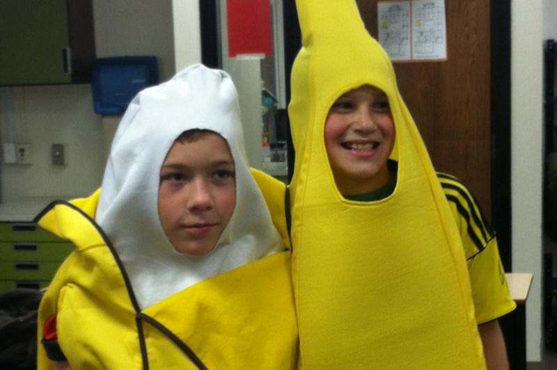 Two boys in banana costumes