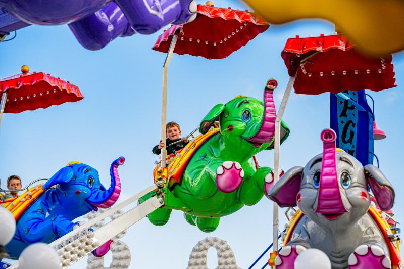 Child riding fair ride