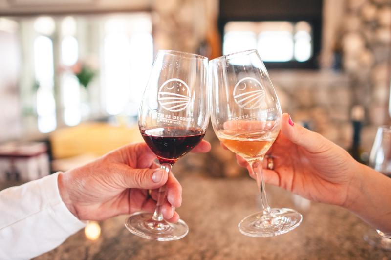 wine glasses in front of fire