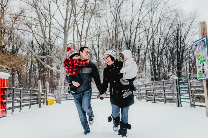 family running in snow