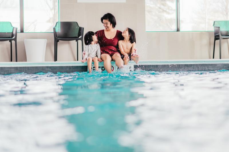 family in pool