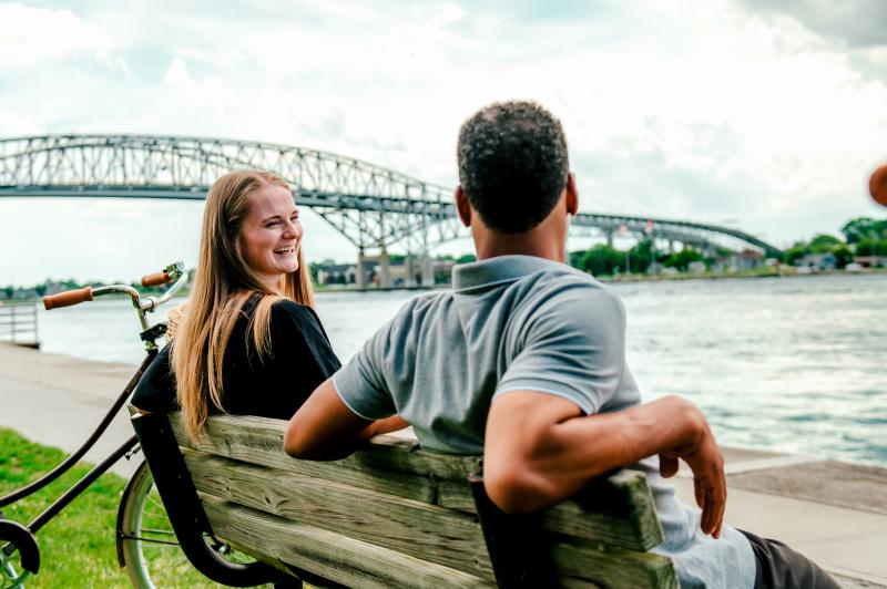 couple on bench by the water