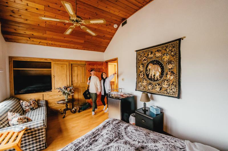 couple walking into room