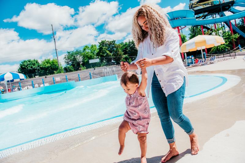 woman and child by pool