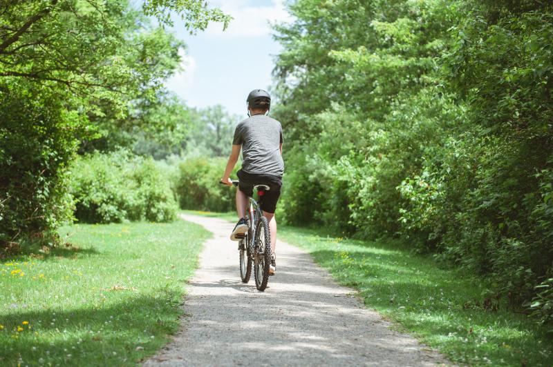 Man riding on trail