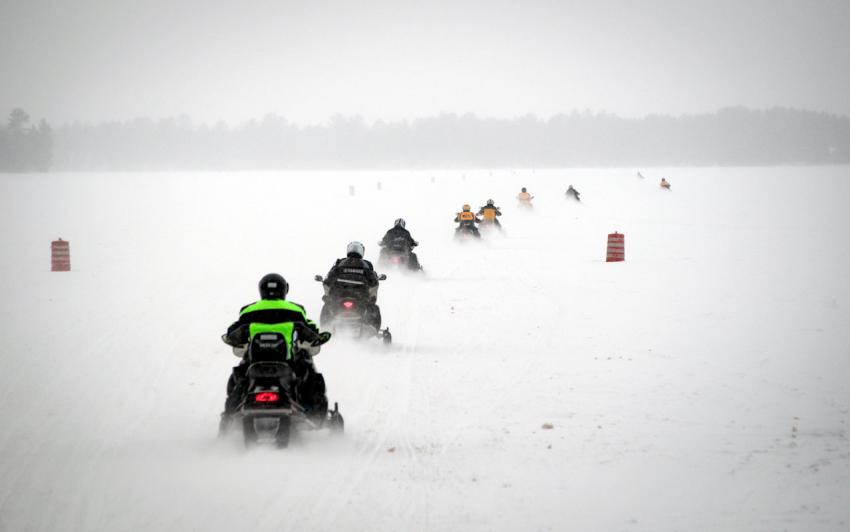 snowmobilers riding