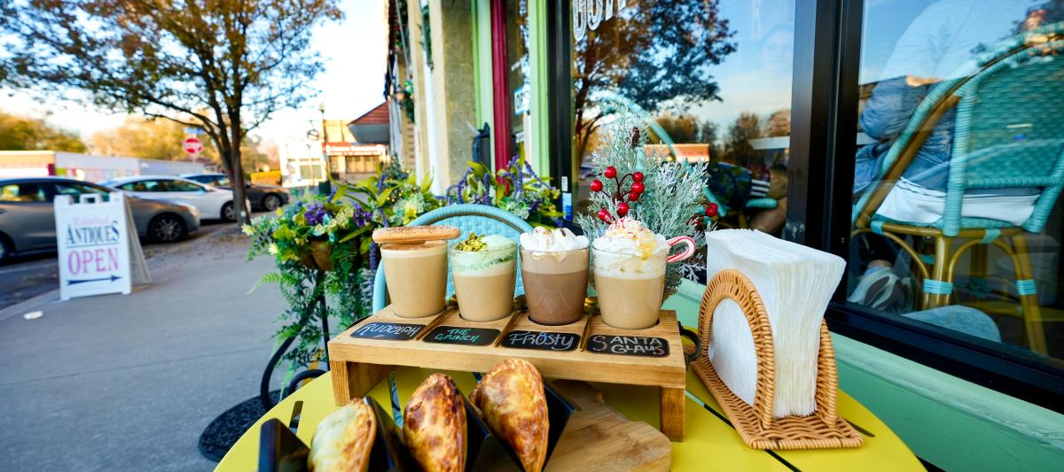 Coffee flight outside cafe