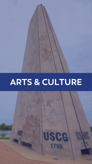 Arts & Culture information button showcasing the Veterans Memorial at Sugar Land Memorial Park.