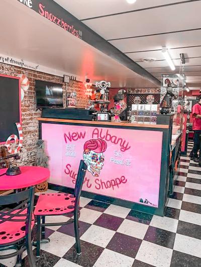 New Albany Sugar Shoppe counter display, near brightly colored tables and chairs.