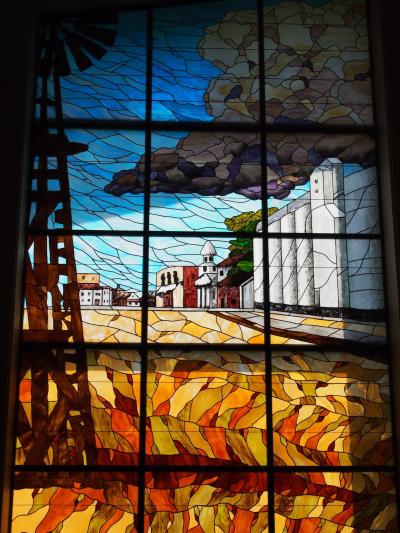 A stained glass representation of Russel, Kansas