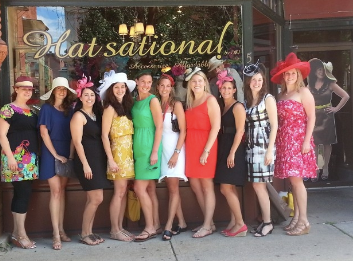 group posing in front of Hatsational 