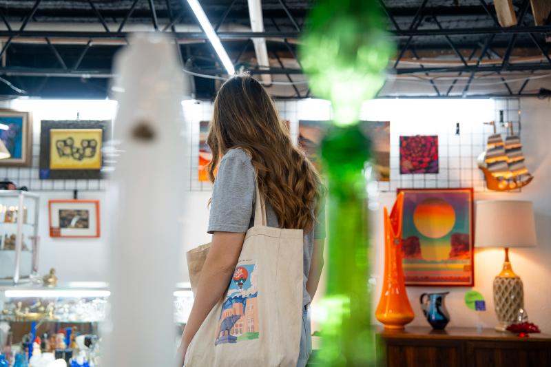 A college student shops at Vintage Vault in Nob Hill.