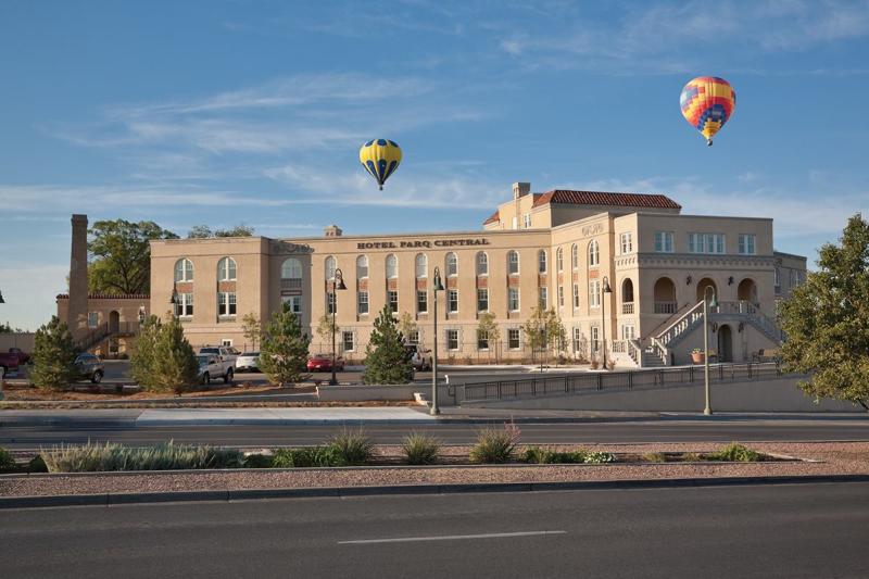 Two hot air balloons fly over Hotel Parq Central