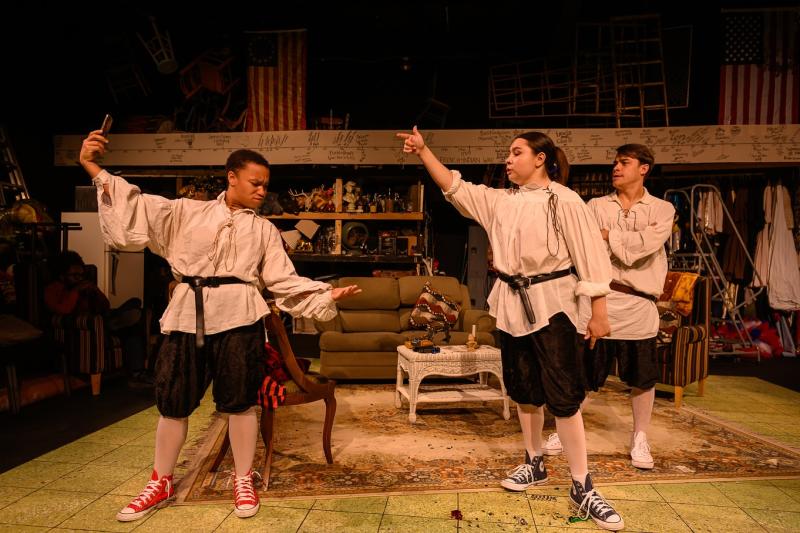 Three actors perform at The Vortex Theatre during The Complete History of America (Abridged).