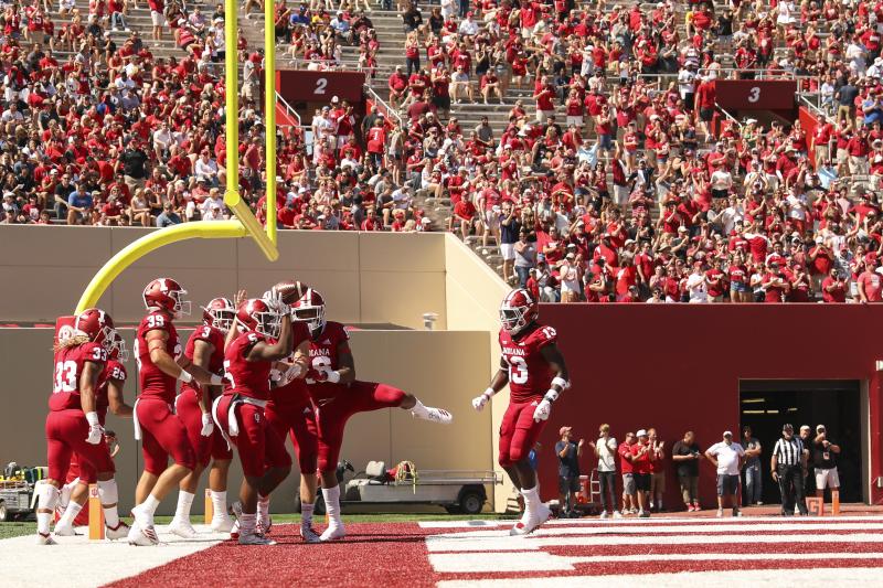 Hoosiers celebrating a touchdown on the field