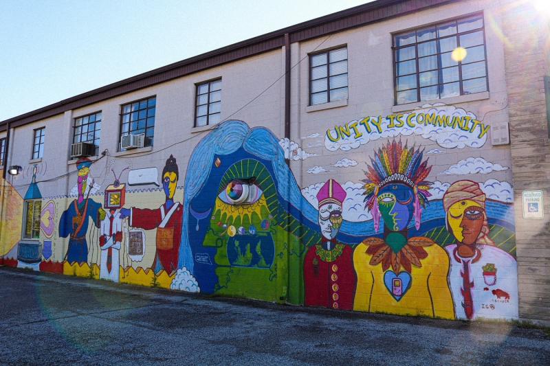 "Unity is Community" Mural along Artisan Alley