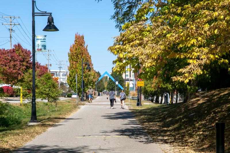 People walking on the B-Line Trail during fall