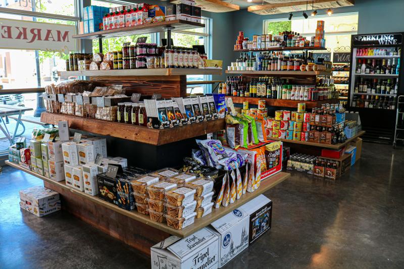 Displays of various food items at Capisce Market