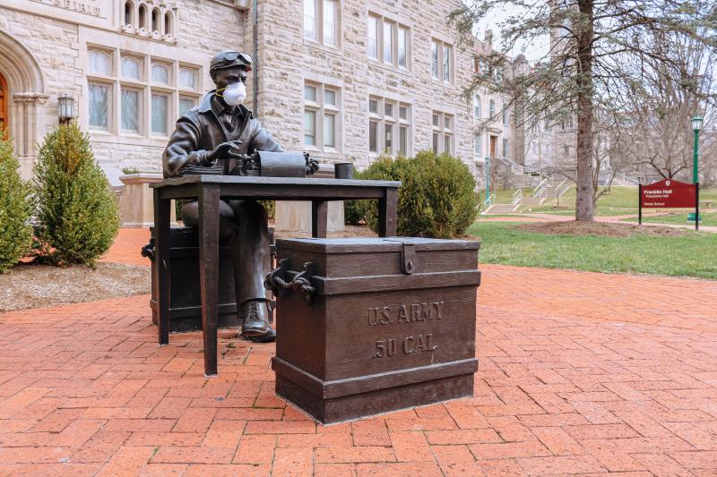 Ernie Pyle Statue wearing a mask