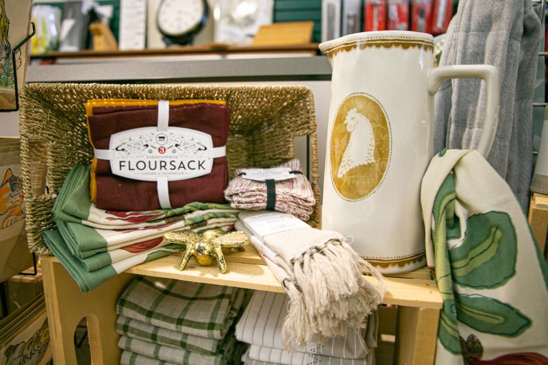 Display of tea towels and a pitcher at Goods for Cooks