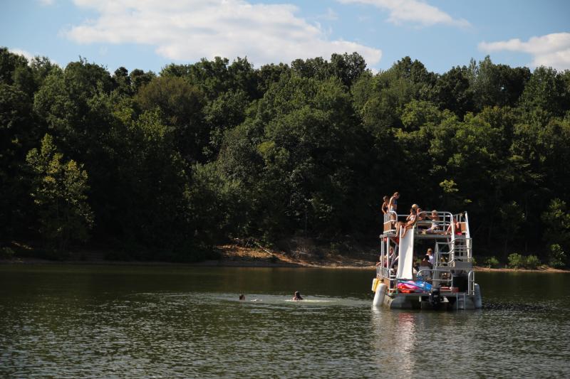 Group of people on a double decker pontoon rental at Lake Monroe