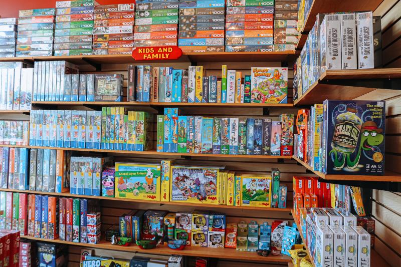 Section of kids & family games at The Game Preserve