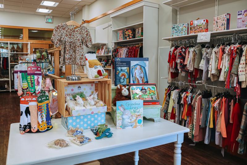 Displays of children's items for sale at O'Child Children's Boutique