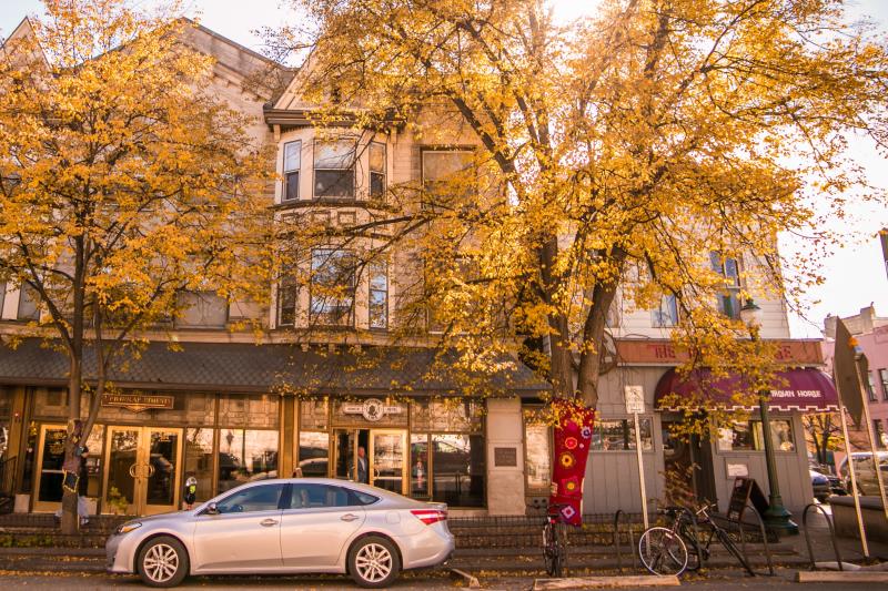 Exterior of Uptown Cafe and The Trojan Horse on a sunny fall day