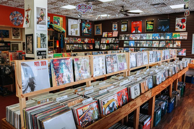 Displays of vinyl records and artwork at Landlocked Music