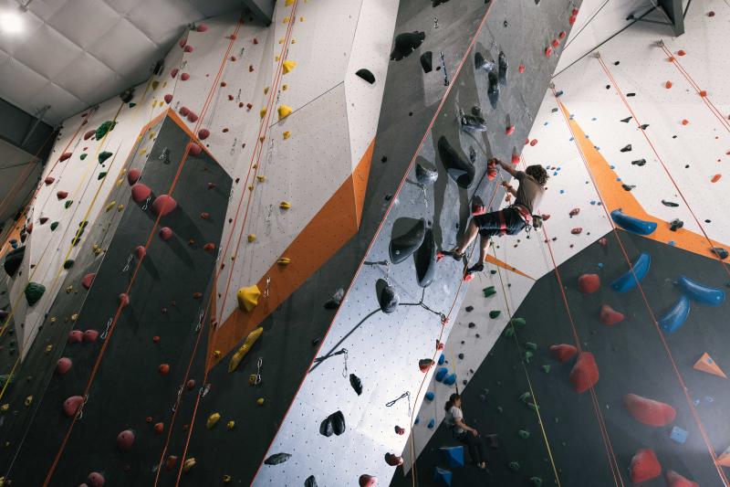 Person clicking the rock wall at Hoosier Heights