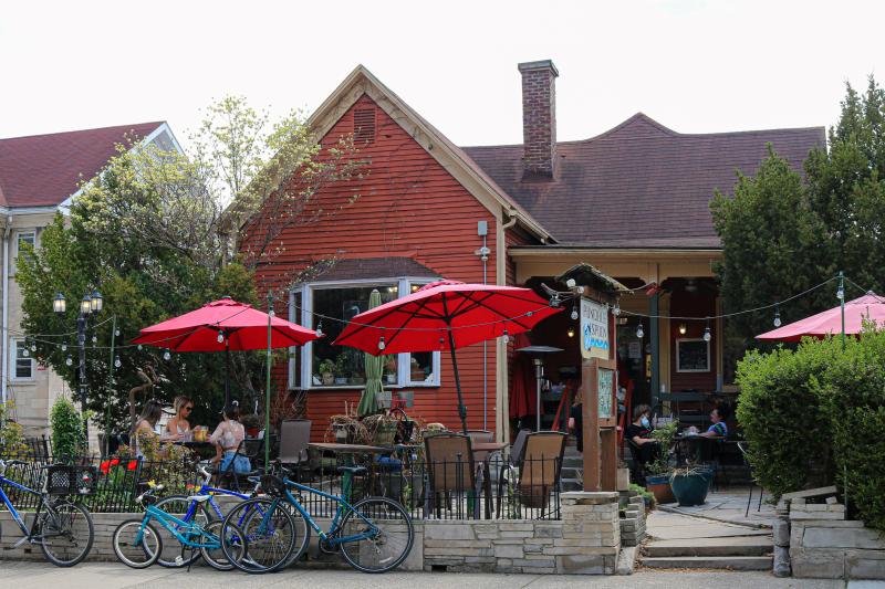 A group of girls dining on the patio at The Runcible Spoon during spring