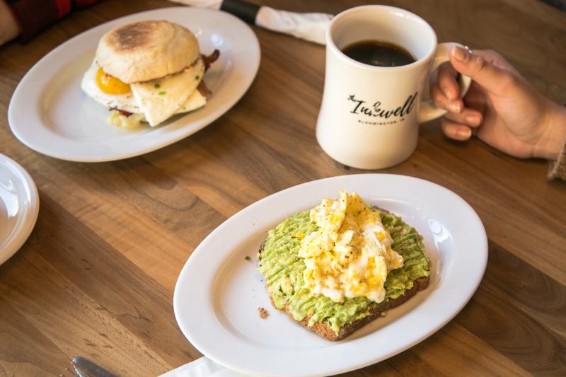 Breakfast sandwich and avocado toast from The Inkwell