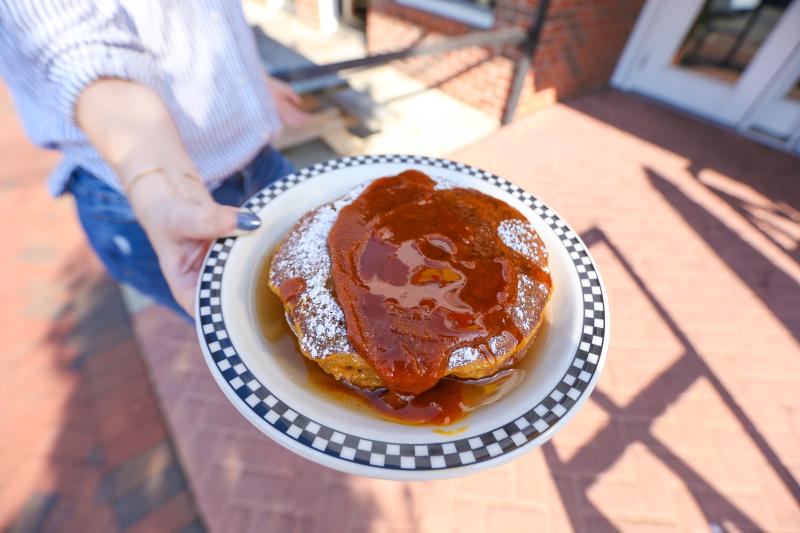 Pumpkin pancakes on a plate at Village Deli in Bloomington, IN