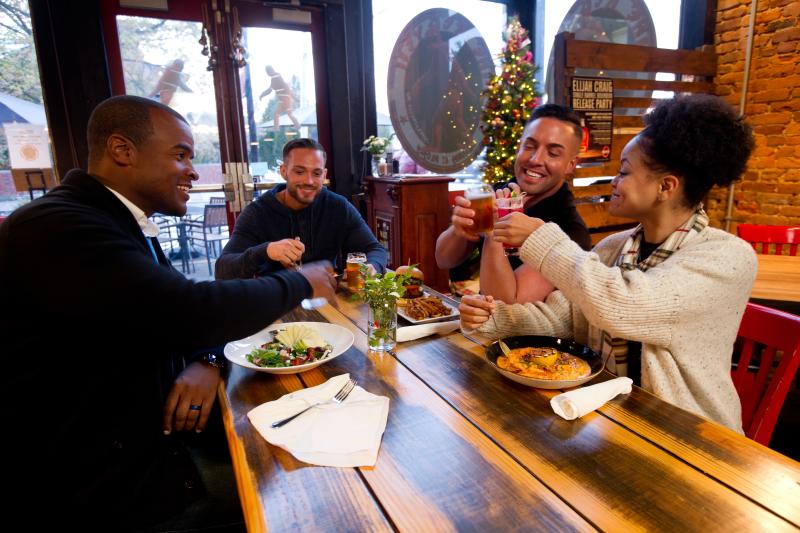 Group eating and drinking beer at Red Yeti