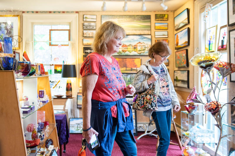 Ladies shopping at Artizanns in downtown Naples