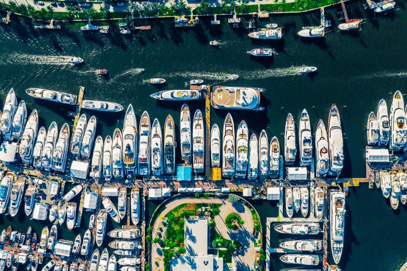 Aerial photo of many yachts moored next to each other