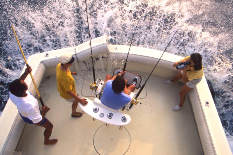 Women Filming 3 People Deep Sea Fishing Near Greater Fort Lauderdale