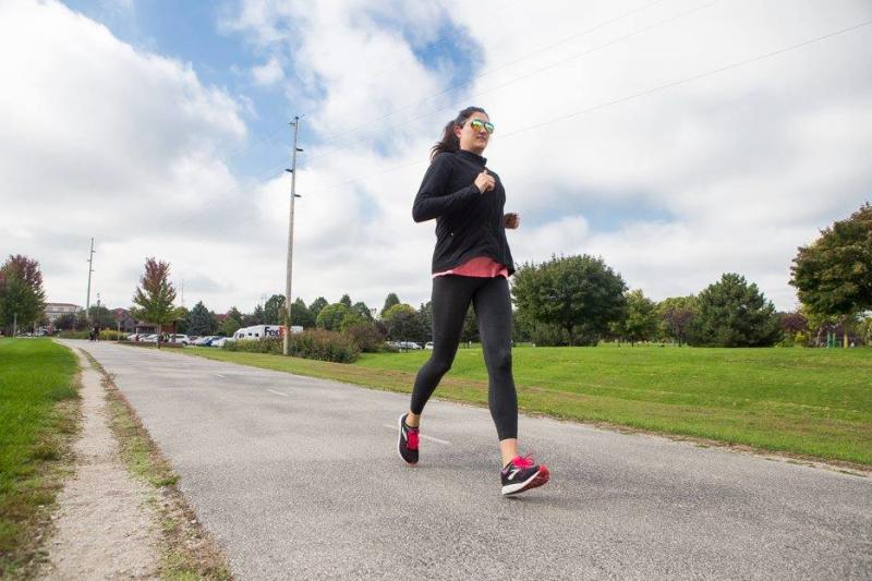 Woman running on trail