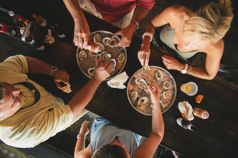 People eating oysters