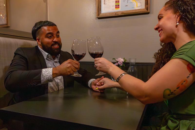 couple toasting at Wine Knot