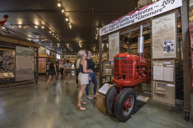 Visitors exploring exhibits at the Loudoun Heritage Farm Museum in Loudoun County
