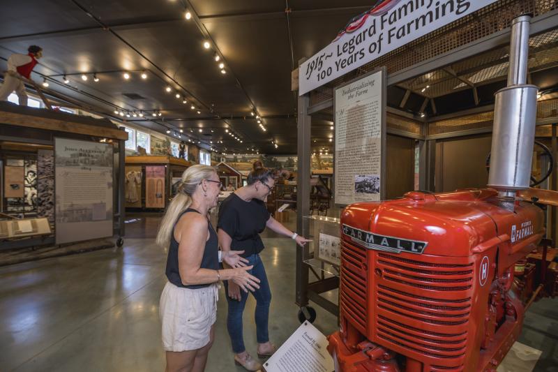 Visitors exploring exhibits at the Loudoun Heritage Farm Museum in Loudoun County