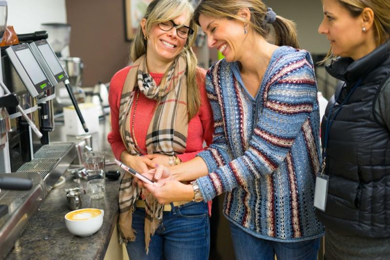 Smiling women at latte art class