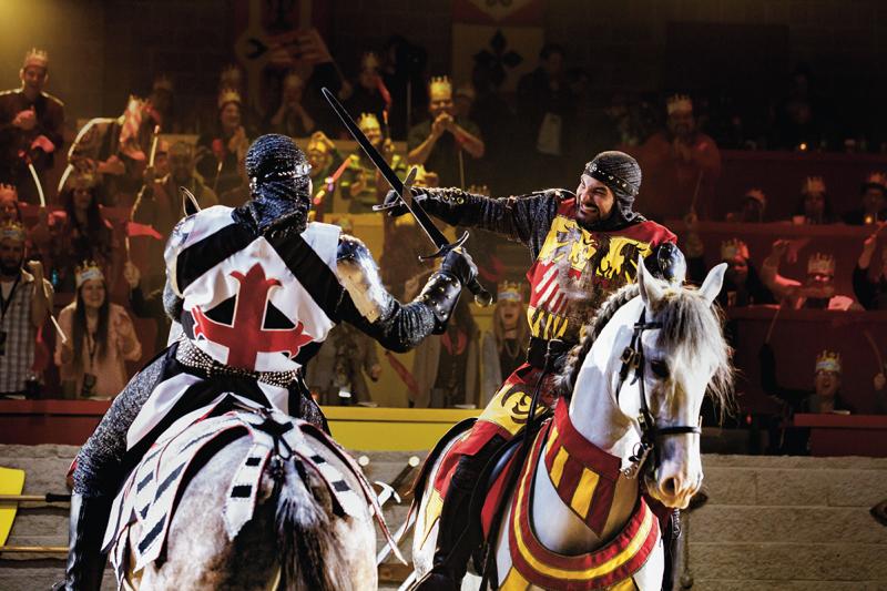Two armored knights on horseback clang swords at Medieval Times Dinner & Tournament, Myrtle Beach, SC