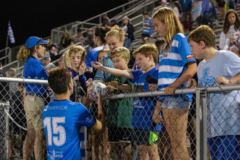 Lionsbridge FC fans getting an autograph