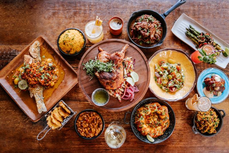 Spread of food at alamar dominican kitchen in Oakland california