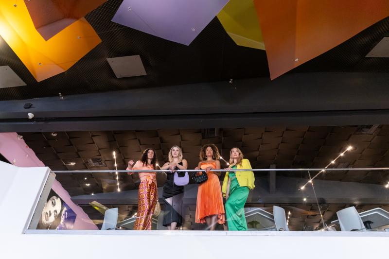 Girls on second floor looking down at LuLu California Bistro in Palm Springs